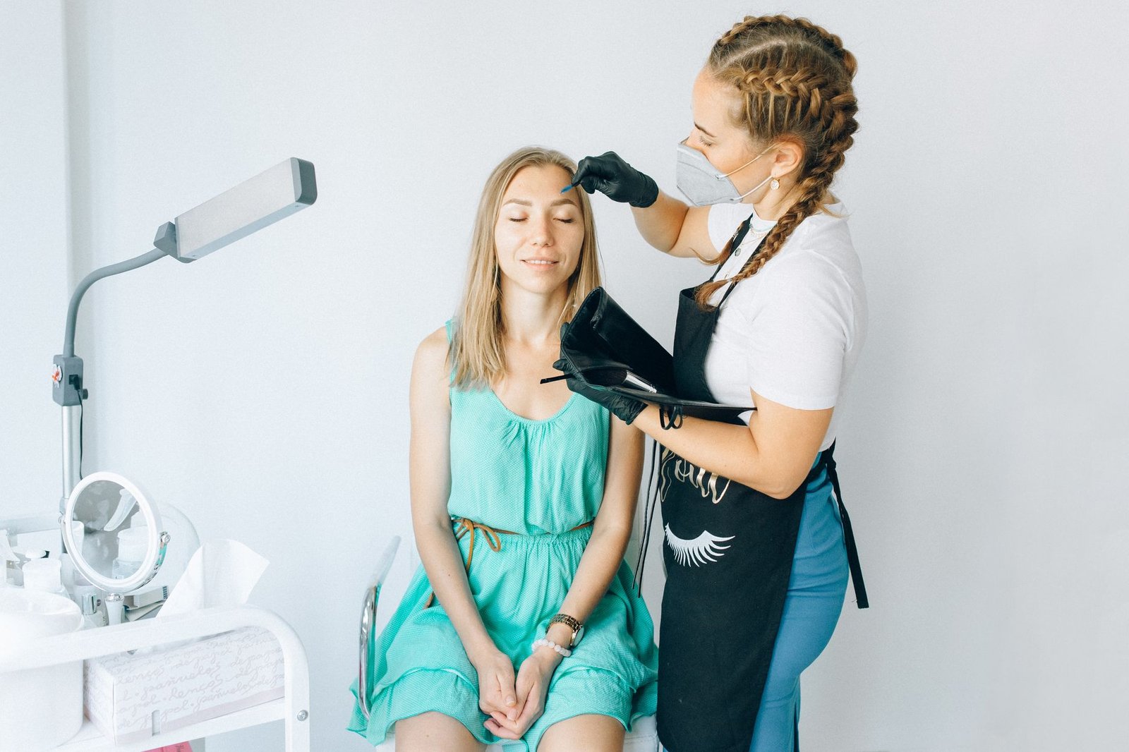 Microblading eyebrow procedure at Rare Beauty Studio