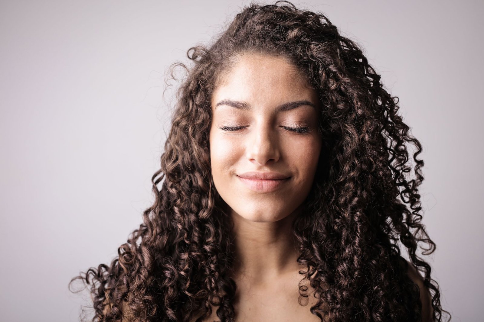 Close-up of smooth, healthy facial skin representing common microneedling goals.