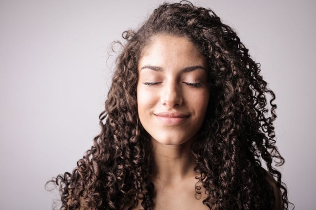 Close-up of smooth, healthy facial skin representing common microneedling goals.