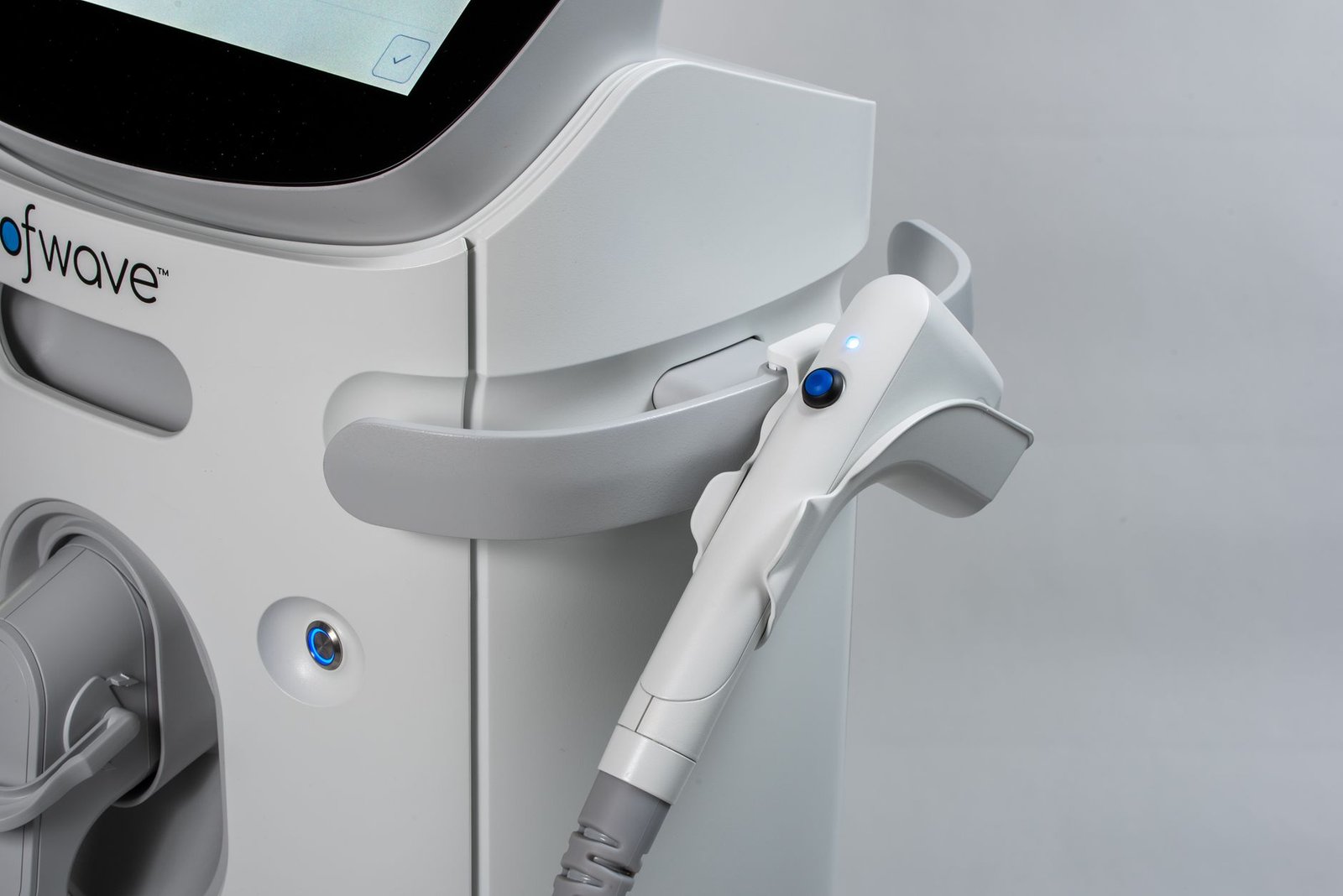 Close-up of a skin treatment device tip used during a professional session.